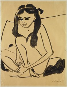 Chica desnuda agachada